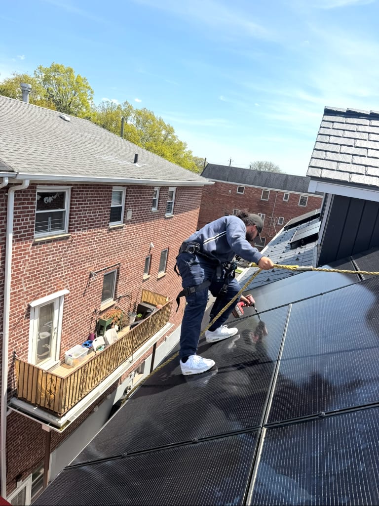 Apex Energy team lead conducting a site assessment on a Hamptons estate
