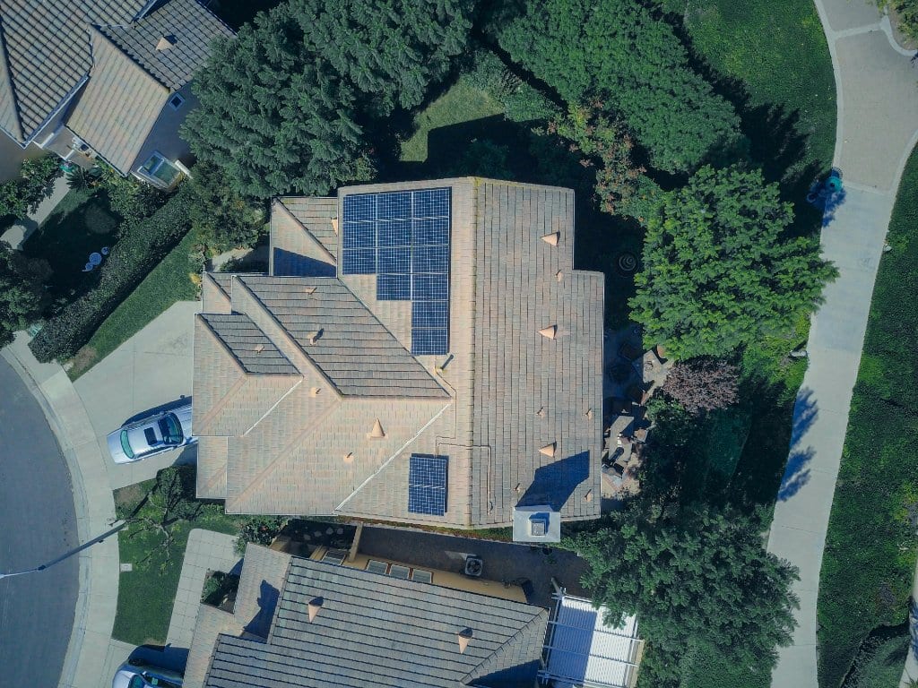 Cedar shake re-roofing and historic district solar integration on a Sag Harbor captain's house